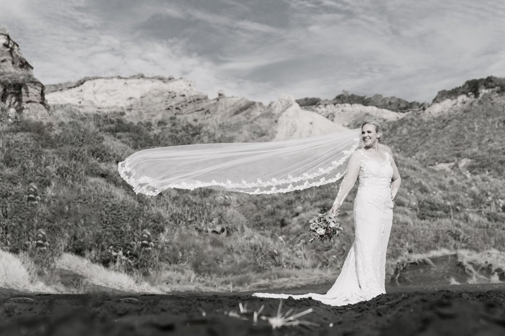 Real Bride Jamielle wearing her Custom Harriett Falvey Wedding Dress and Veil Made in New Zealand